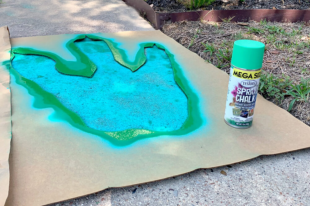 DIY Dinosaur Tracks out of chalk for a dinosaur party